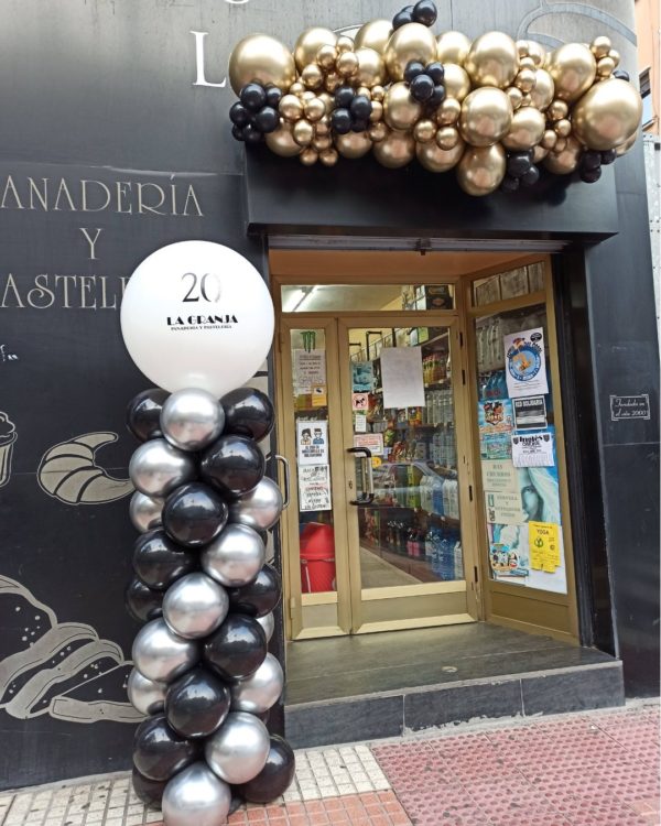 Guirnalda de globos dorada y negro
